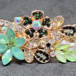 Elegant Floral Rhinestone Hair Clip in Green and Crystal Clear Tones